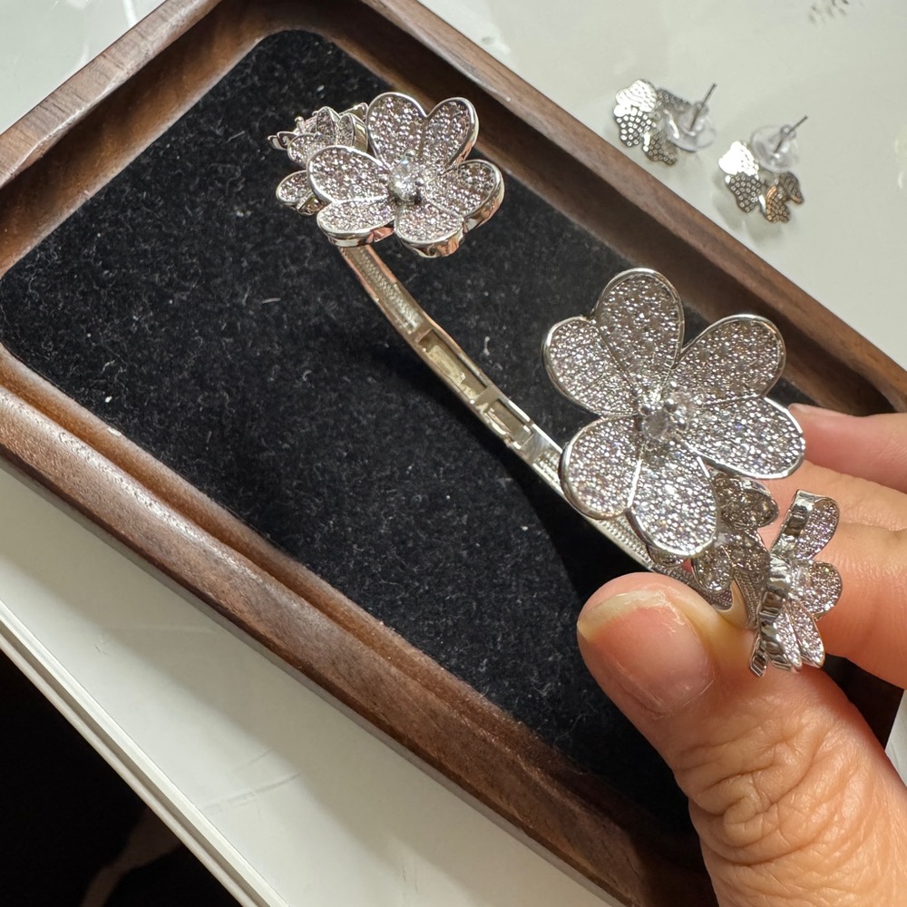 Elegant Silver Floral Bracelet and earrings set